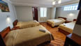 cuatro camas habitacion hotel cusco