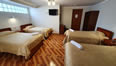 cuatro camas habitacion hotel cusco